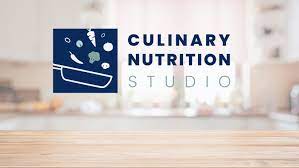 Culinary Nutrition Graphic says "Culinary Nutrition Studio" with a wooden counter kitchen and blue image of a pan with food coming out of it | JK Nutrition Consulting